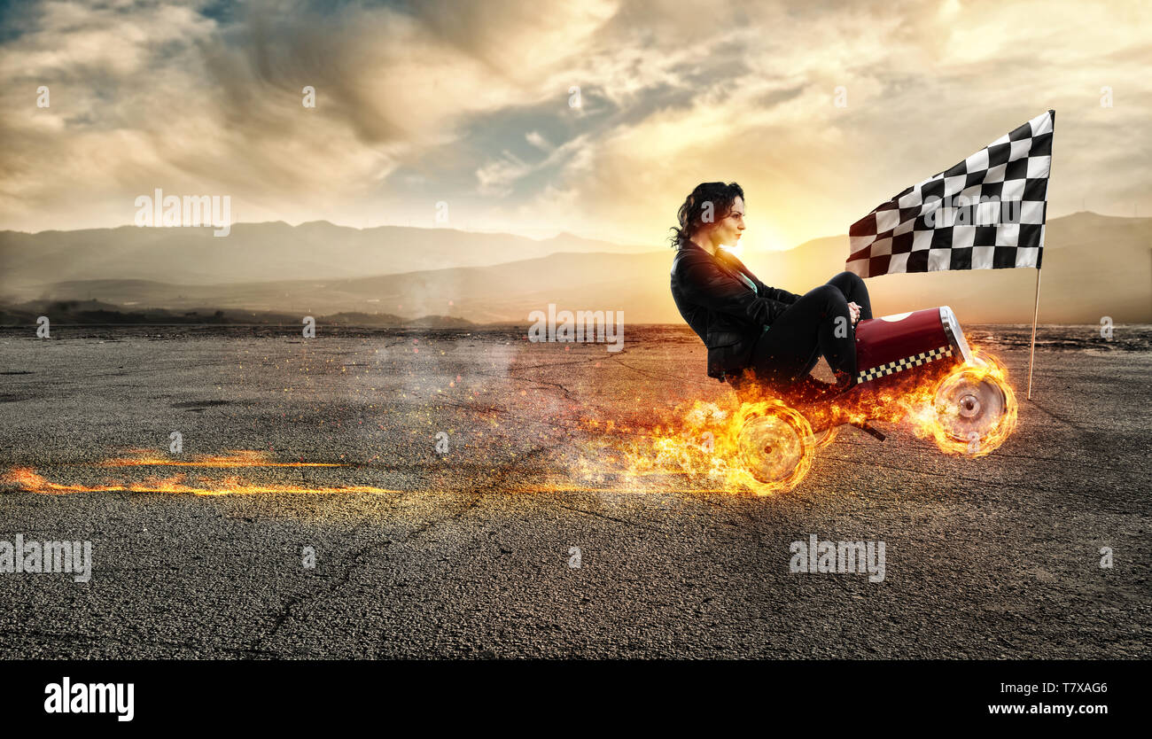 Fast businesswoman with a car wins against the competitors. Concept of success and competition. Flag, competitor. Stock Photo