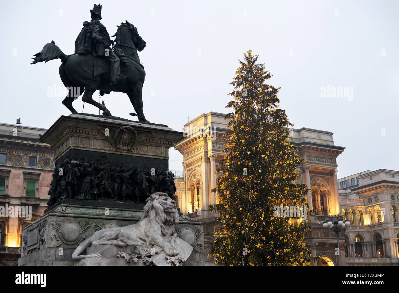 Marble Lion and Christmas tree: Milan square of duomo. Italy Stock Photo