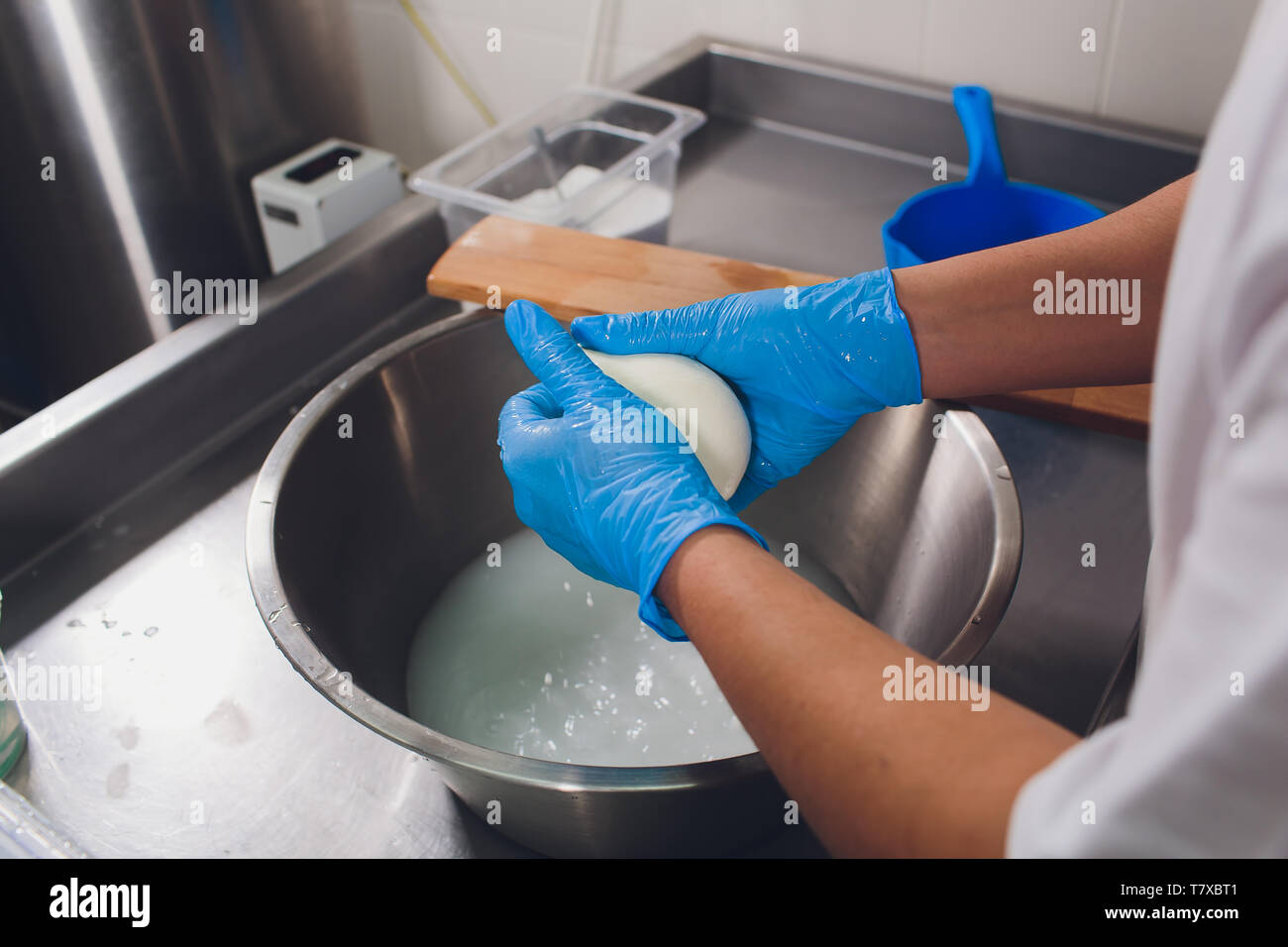 Production process of mozzarella cheese, cheese making process Stock ...