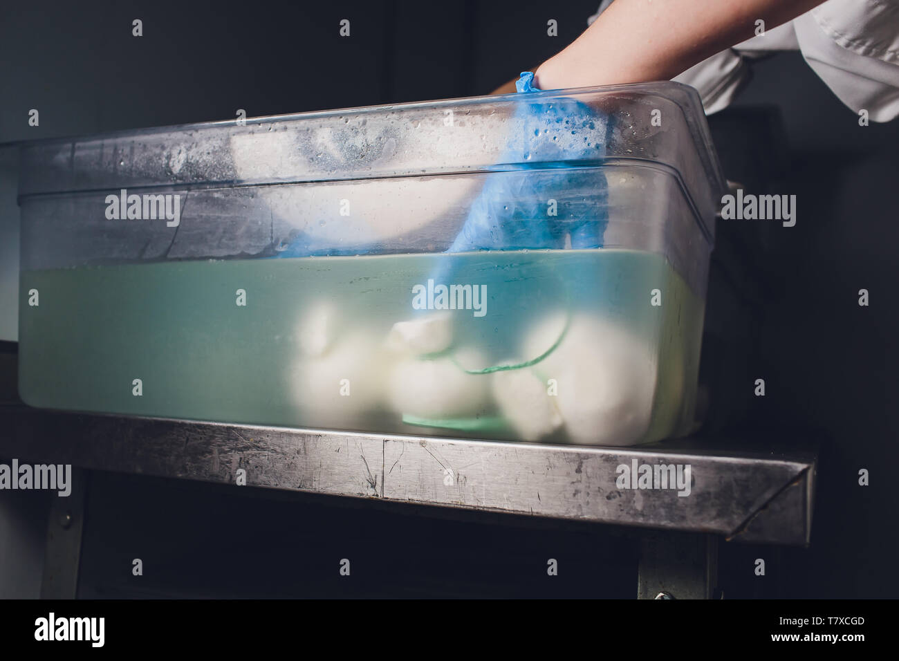 Production process of mozzarella cheese, cheese making process Stock Photo Alamy