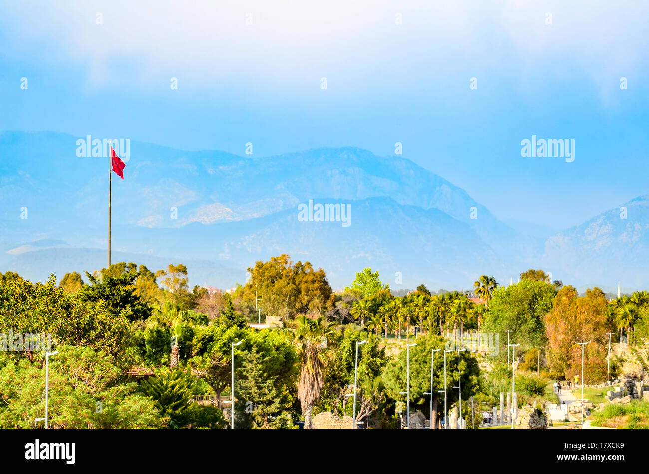 Turkish flag in Side against the mountains Stock Photo Alamy