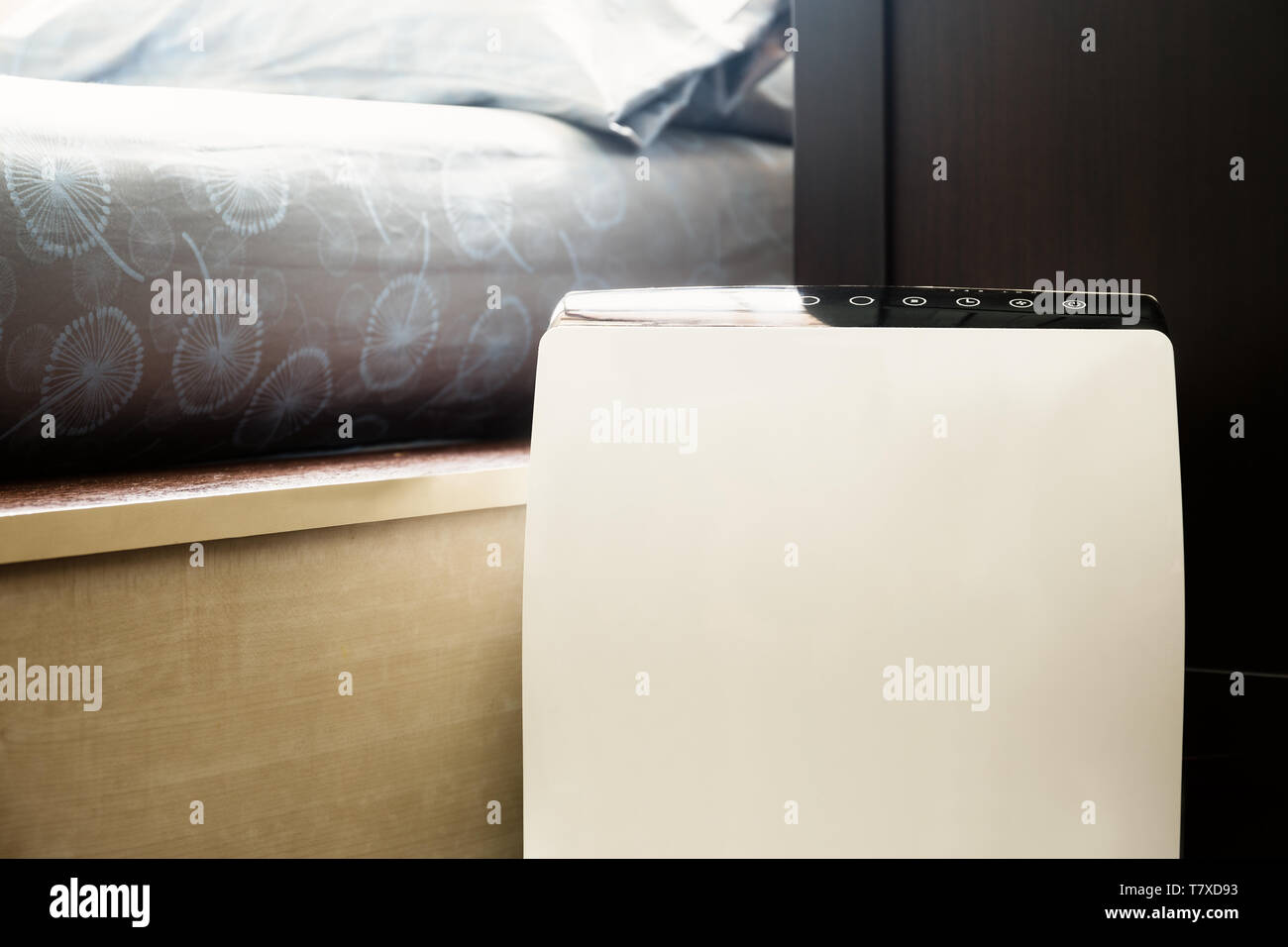 Air purifier in the bed room cleaner removing fine dust in house Stock Photo Alamy