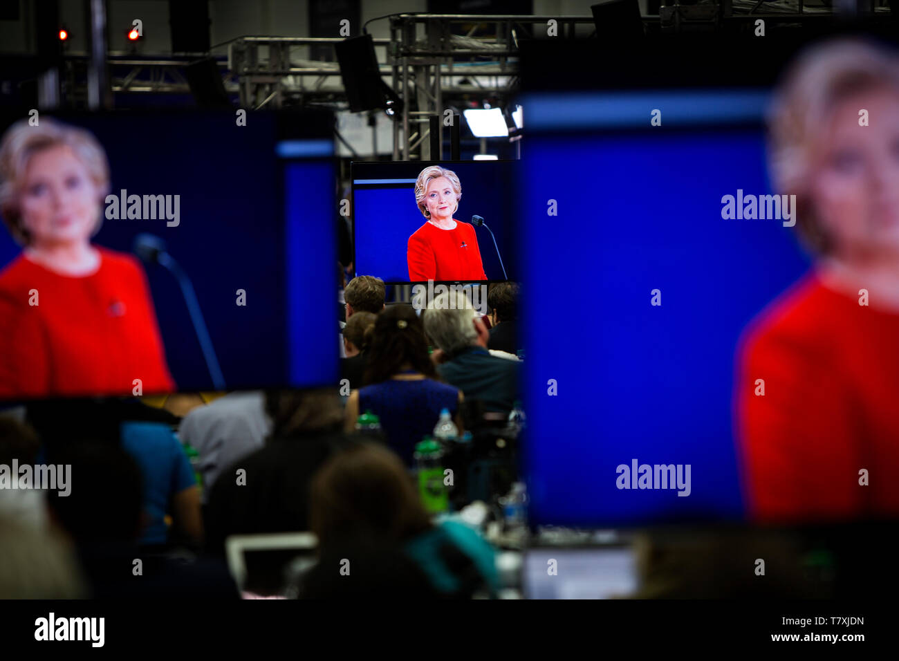 Reporters listen to Hillary Clinton at the debate. The Democrate and Republican nominees for US President, Hillary Rodham Clinton and Donald John Trump, met on Sep. 26th for the first head to head Presidential Debate at the Hofstra University in Long Island. Stock Photo