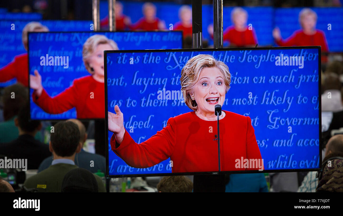 Reporters listen to Hillary Clinton at the debate. The Democrate and Republican nominees for US President, Hillary Rodham Clinton and Donald John Trump, met on Sep. 26th for the first head to head Presidential Debate at the Hofstra University in Long Island. Stock Photo