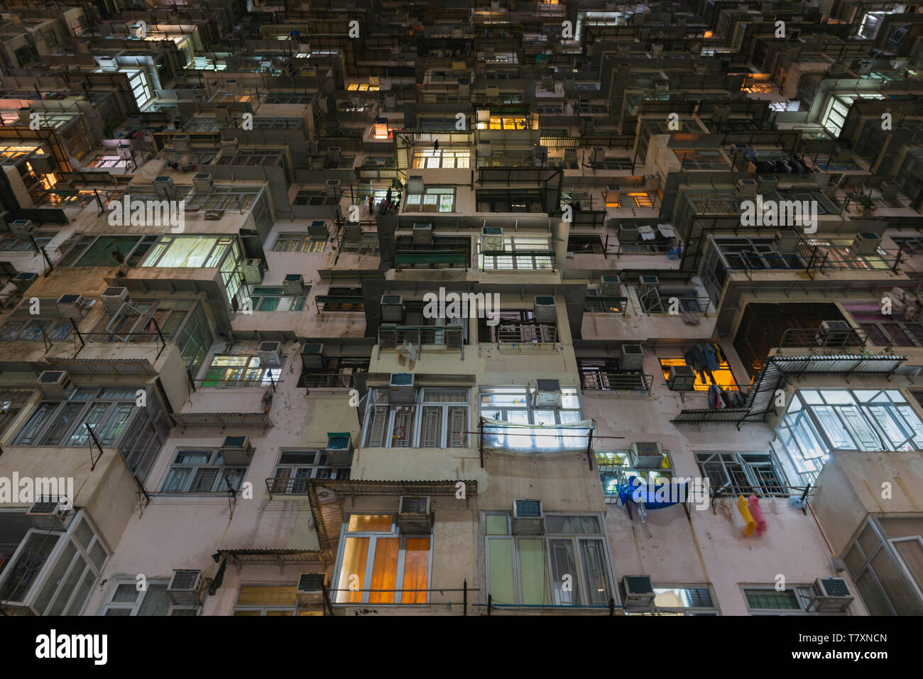 Night view of an old complex apartment in Hong Kong. Stock Photo