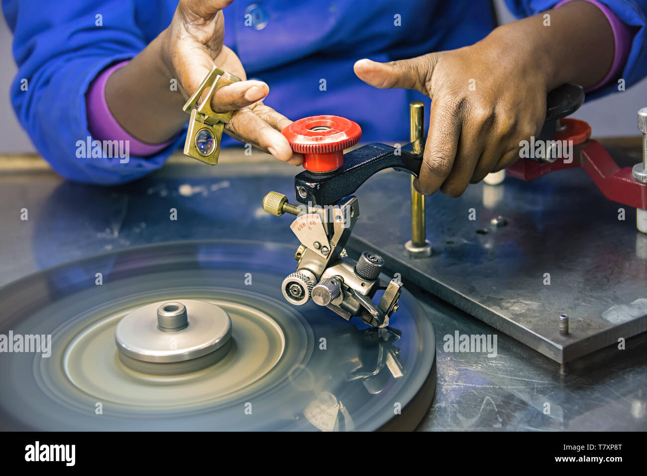 Machines to polish diamonds, grading diamonds, african woman working. In Africa , Botswana Stock Photo