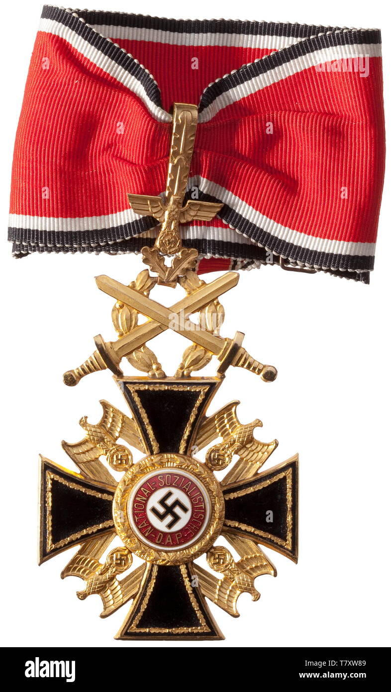German Order - 1st Class Cross with Laurel Wreath and Swords. Multi-piece production of the highest jeweller's art. Enamelled non-ferrous metal, fire gilt with polished edges. Black enamelled cross pattée with applied medallion in the shape of a size- reduced golden party badge, 'Adolf Hitler' within the reverse of the stepped medallion. The four national eagles applied separately. Weight 47.9 g. The original neck ribbon included. Unquestionably original, and of the utmost rarity. The German Order was the highest award of the NSDAP, awarded for the highest merit (tr) 'that , Editorial-Use-Only Stock Photo