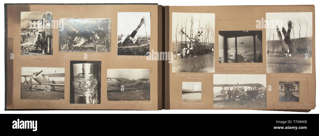 A photo album of Replacement Flying Detachment 6 - Defence Squadron 11. Inscribed album with ca. 354 top quality images of German aviation personnel. Biplanes and monoplanes of many types, aerial views of military installations, aircraft and towns, group images with decorations, trenches, aircraft with special paint, recognition and other markings. Images of crashed and shot-down machines, visit to the troops by Crown Prince Wilhelm of Prussia and General Field Marshal von Hindenburg, portraits, pictures of the 'flyer's goblet', Boelcke wearing h, Additional-Rights-Clearance-Info-Not-Available Stock Photo