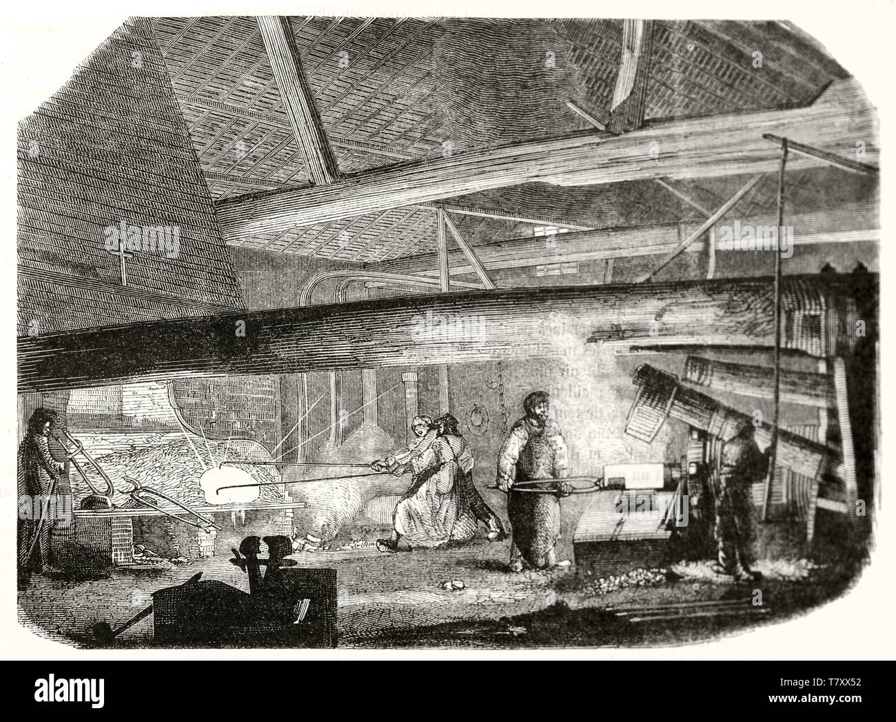 Ancient workers using machines in a warm foundry. Grayscale etching style illustration by unidentified author publ. on Magasin Pittoresque Paris 1848 Stock Photo