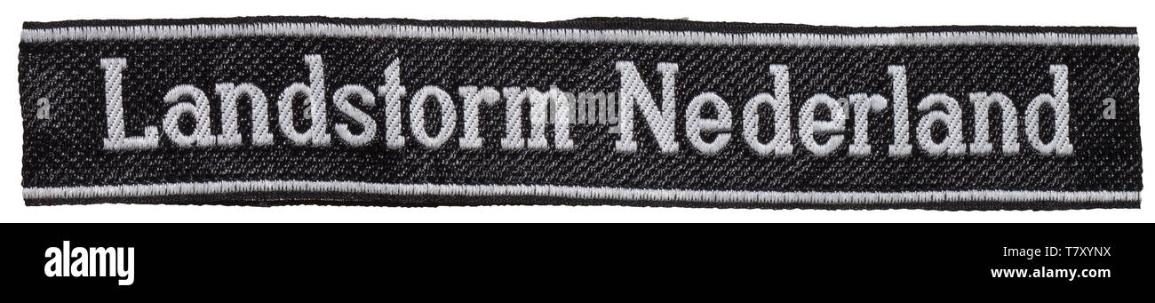 A sleeveband 'Landstorm Nederland' for enlisted men/NCOs of the 34th SS-Freiwilligen-Grenadier-Division. Black and silver-grey woven BeVo type. Unissued. Length 42 cm. historic, historical, 20th century, 1930s, 1940s, secret service, security service, secret services, security services, police, armed service, armed services, NS, National Socialism, Nazism, Third Reich, German Reich, Germany, utensil, piece of equipment, utensils, object, objects, stills, clipping, clippings, cut out, cut-out, cut-outs, fascism, fascistic, National Socialist, Nazi, Nazi period, uniform, unif, Editorial-Use-Only Stock Photo