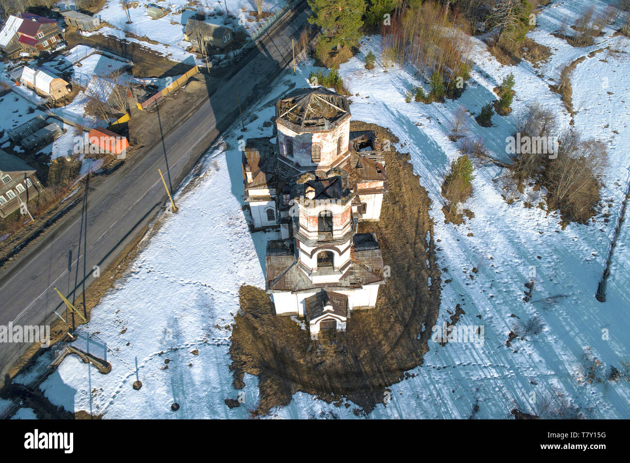 Abandoned Church of the Nativity in the village of Verkhruchey, April day (aerial photography). Karelia. Russia Stock Photo