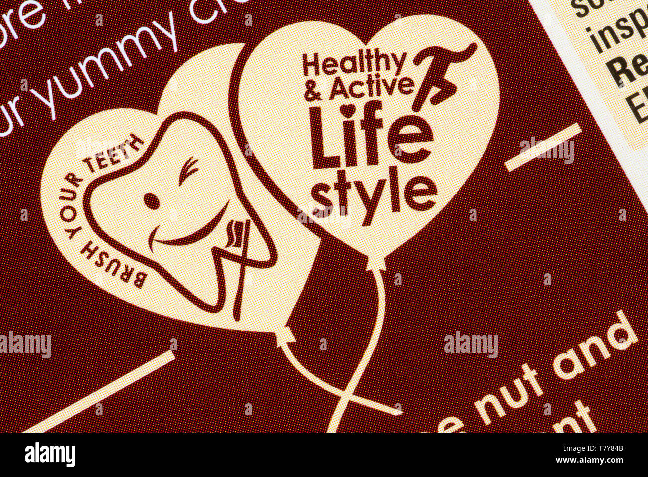 Brush your teeth, healthy & active life style symbols - detail on box of Kinnerton Peppa Pig Easter Gift Set Stock Photo