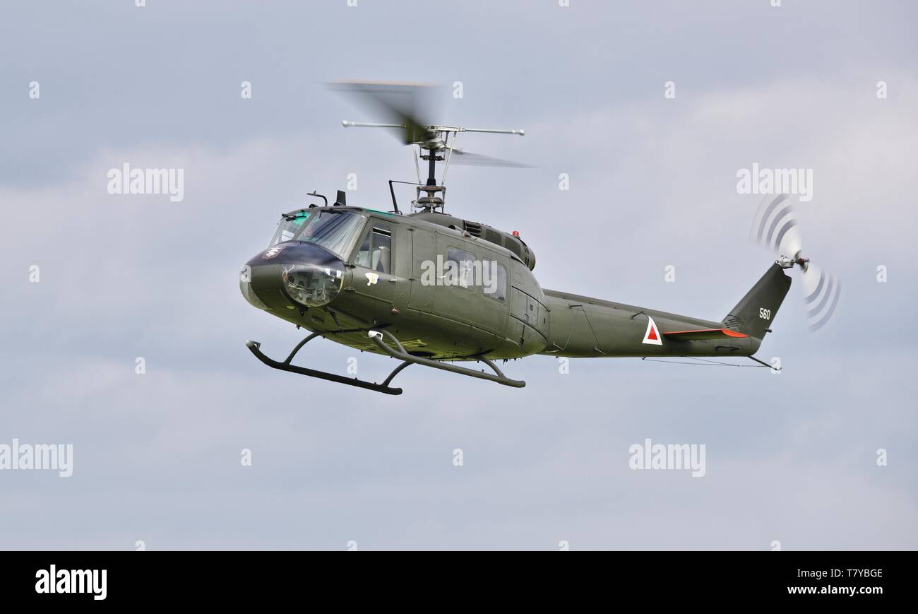 Bell UH-1 Iroquois 'Huey' flying at the season premiere at Shuttleworth on the 5 May 2019 Stock Photo