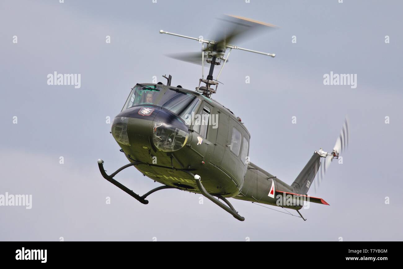 Bell UH-1 Iroquois 'Huey' flying at the season premiere at Shuttleworth on the 5 May 2019 Stock Photo