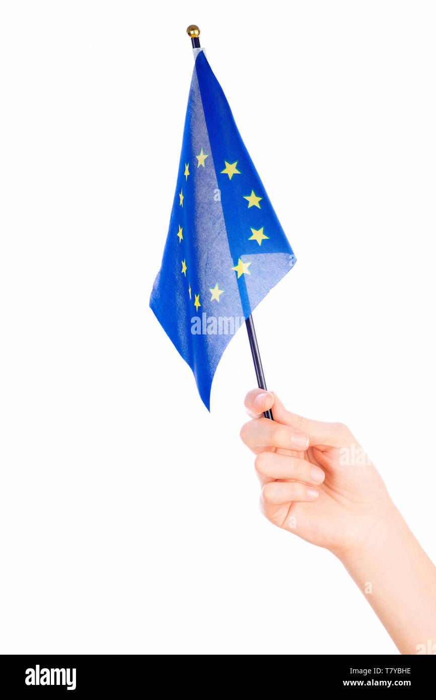Woman hand waving the flag of European union on white Stock Photo