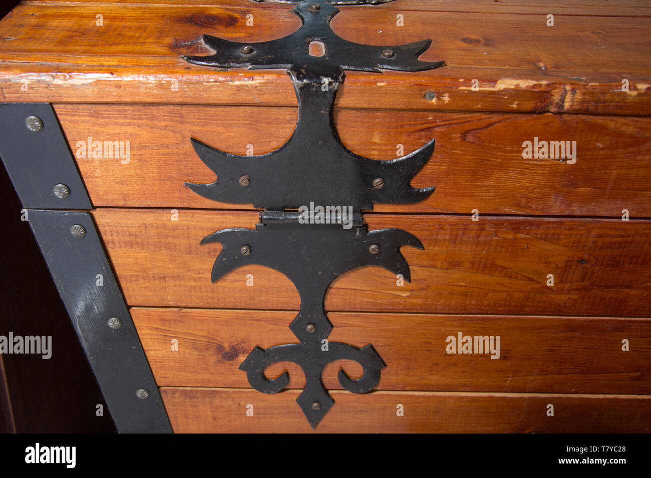 black metal handmade hinge on wooden chest Stock Photo Alamy