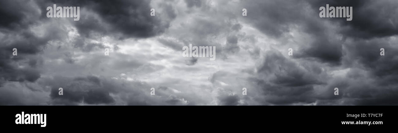 Panorama of beautiful thunder clouds. Rainy clouds over horizon. Stock Photo