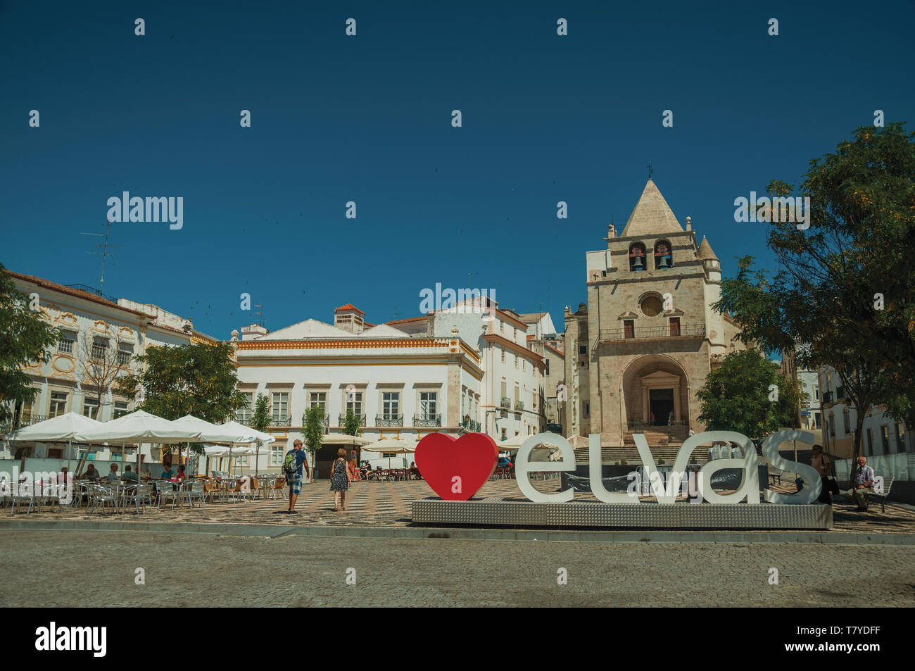 Large signpost with the city name and church of Our Lady of the Assumption at Elvas. A gracious city on the easternmost frontier of Portugal. Stock Photo
