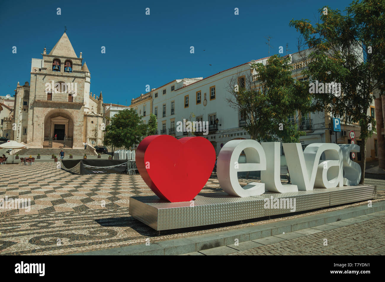 Large signpost with the city name and church of Our Lady of the Assumption at Elvas. A gracious city on the easternmost frontier of Portugal. Stock Photo