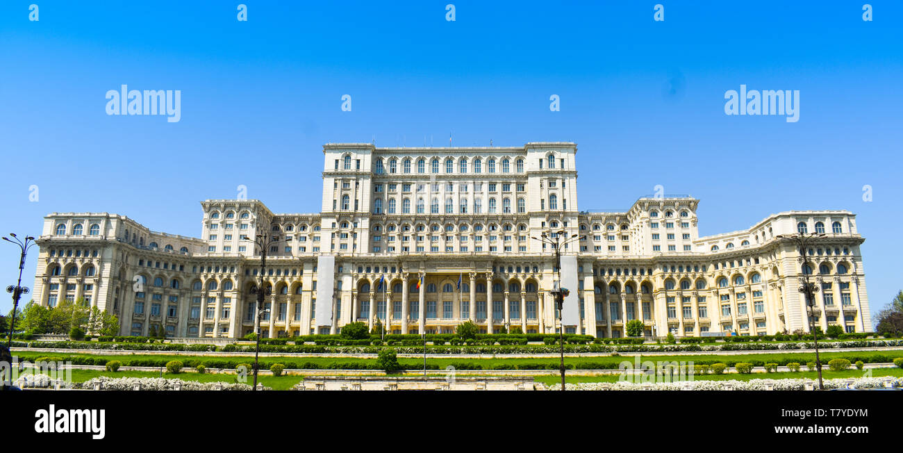 The Palace of the Parliament or People's House, Bucharest, Romania. Night view from the Central Square.  The Palace was ordered by Nicolae Ceaușescu Stock Photo