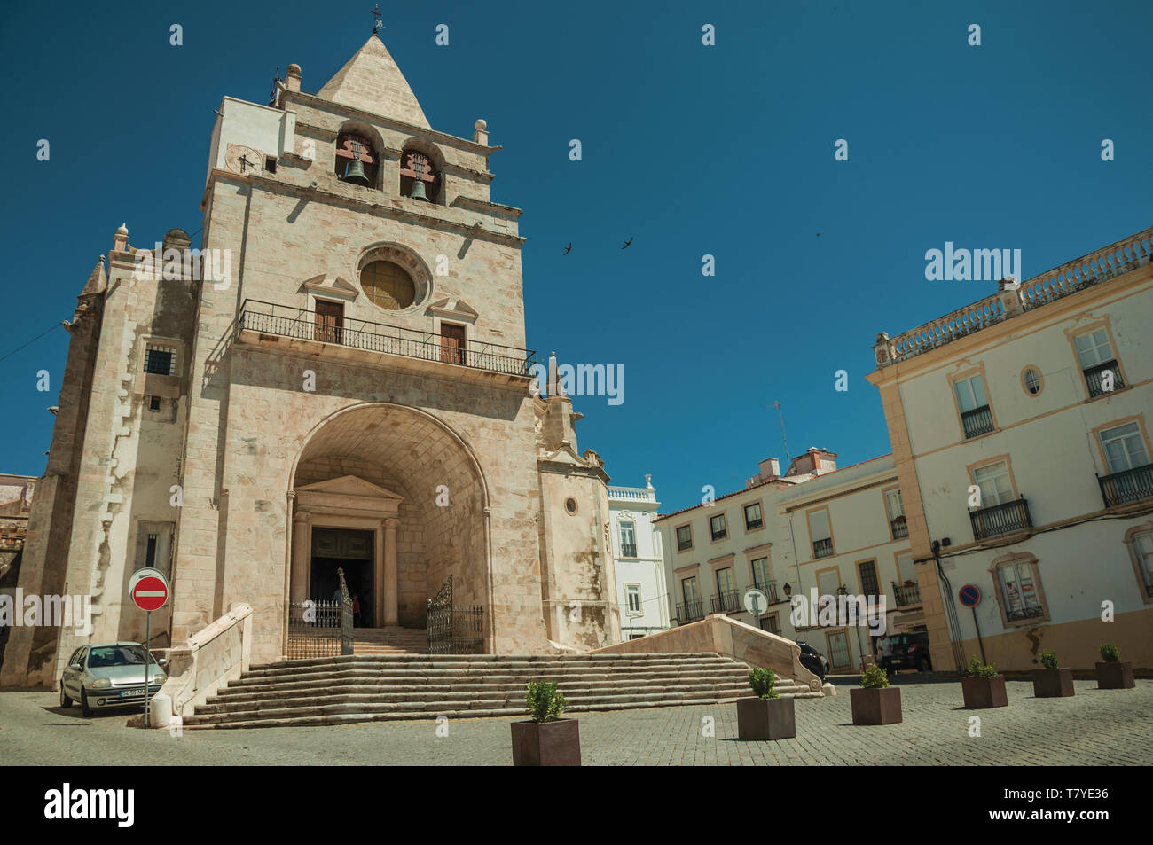 Our Lady of the Assumption Cathedral and old buildings on a square in a sunny day at Elvas. A gracious city on the easternmost frontier of Portugal. Stock Photo