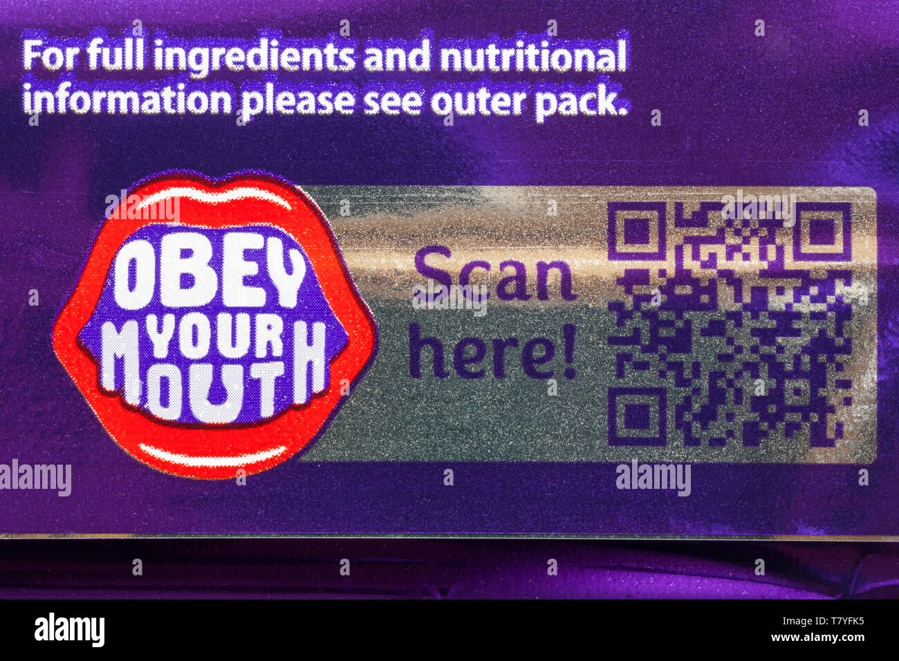 Obey your mouth, scan here - details on back of Wispa chocolate bar Stock Photo