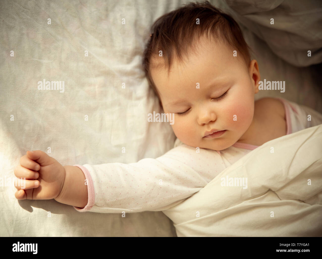 Cute baby sleeping in bed Stock Photo Alamy