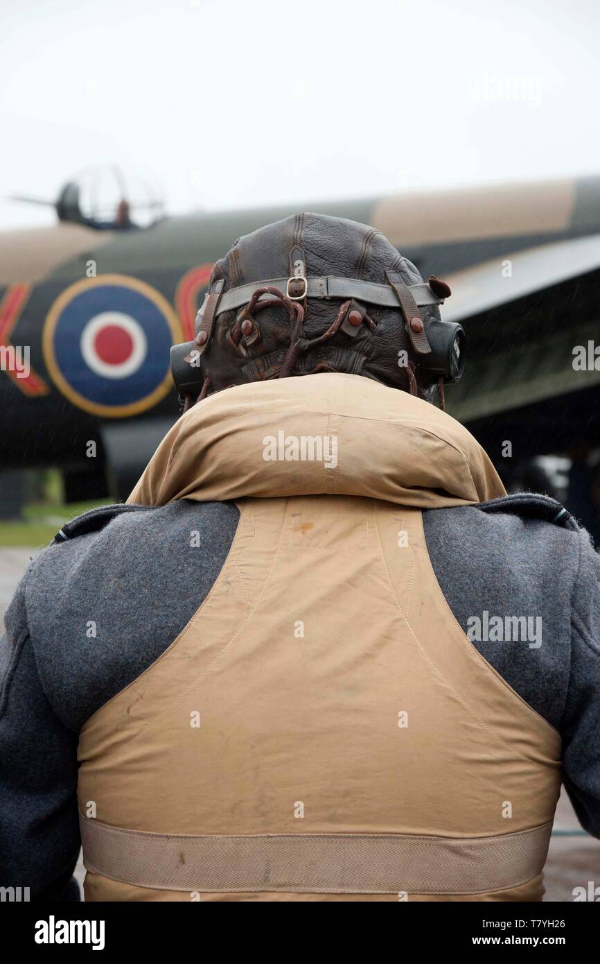 air crew with Avro Lancaster, WW2 heavy bomber on airfield Stock Photo ...