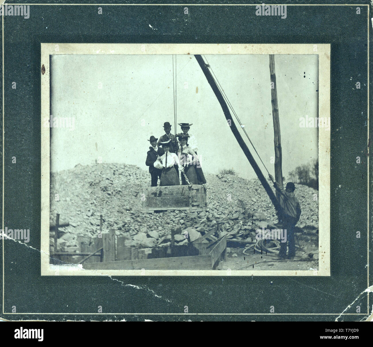 Couples posing in a quarry derrick, ca. 1885.  MP AP Stock Photo