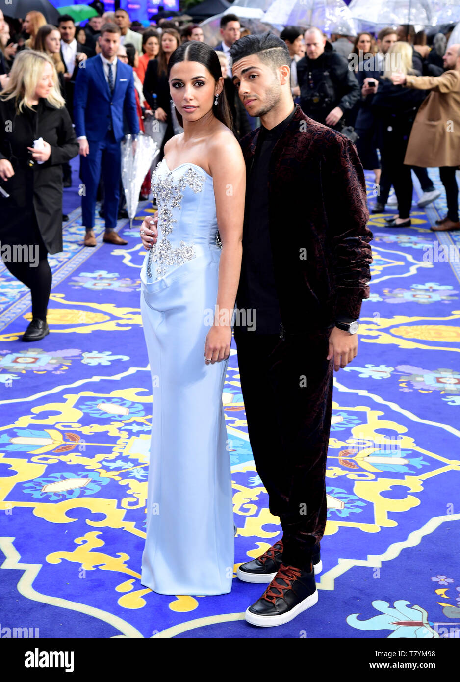 Naomi Scott and Mena Massoud attending the Aladdin European Premiere held at the Odeon Luxe Leicester Square, London. Stock Photo