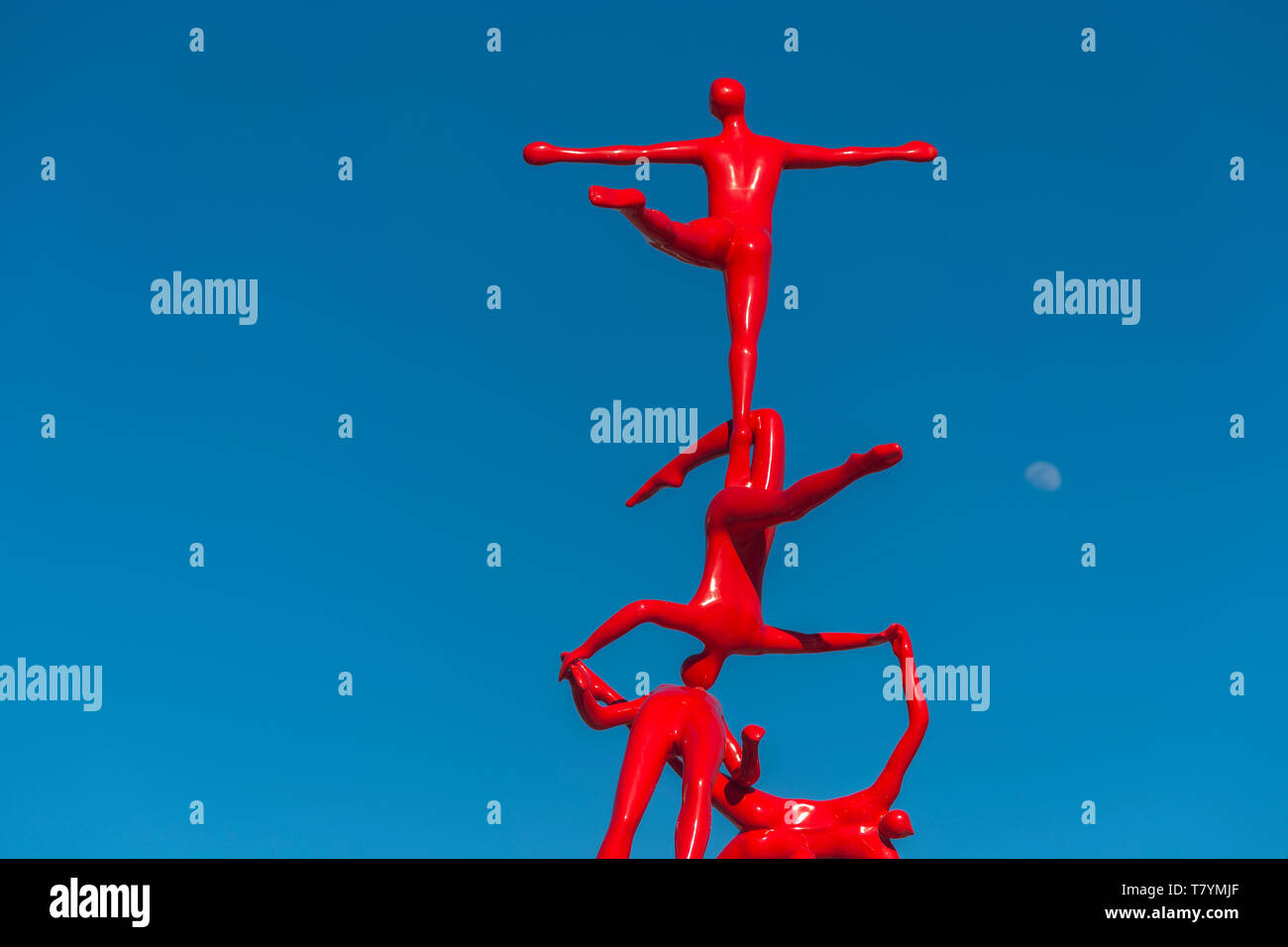 Modern artwork that represents seven athletes dancers who climb, at the coastal avenue of Alexandroupolis - Greece. Created in 2018 by sculptor Kostis Stock Photo