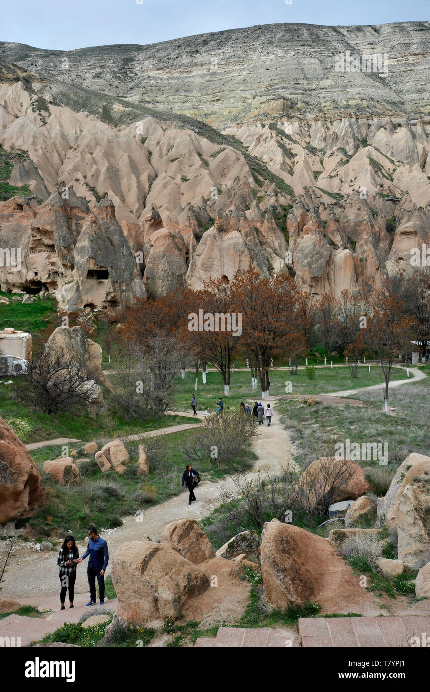 People visiting outdoor museum in Cappadocia, Turkey Stock Photo