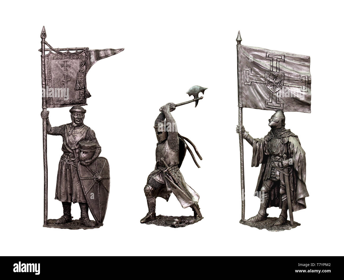 Tin soldiers medieval knights. Set of 3 knights. Knight with banner. Stock Photo