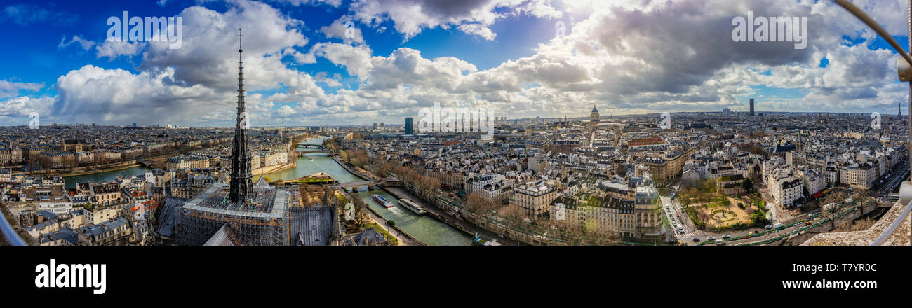 Aerial ultra wide Panorama cityscape of Paris. Skyline and famous landmarks central downtown buildings in the French capital. Stock Photo