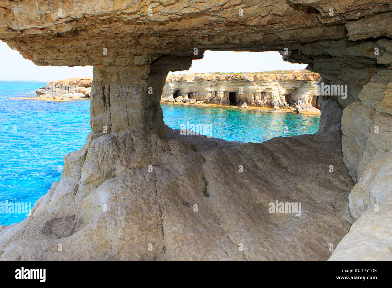 The Sea Caves near Cape Greco, Cyprus with a view at a beautiful turquoise  bay Stock Photo - Alamy