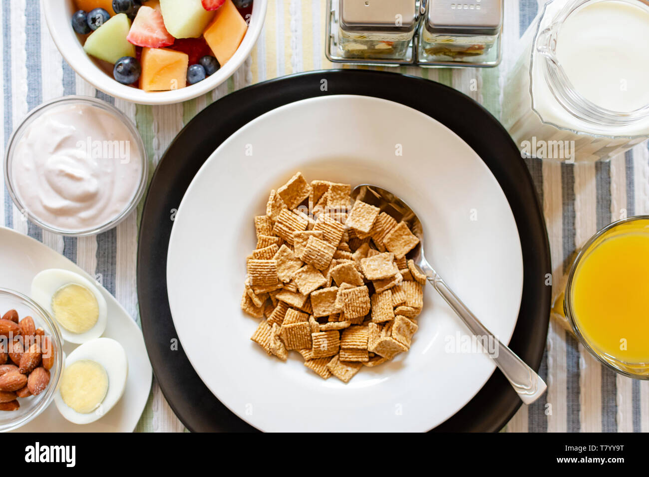 A bowl of cereal as part of a balanced breakfast. Includes Yogurt