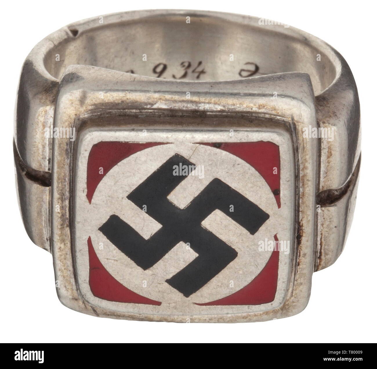 Richard Kolb (1891 - 1945) - Julius Streicher (1885 - 1946). A silver honour ring in art déco style with applied enamelled swastika, the inner surface engraved with dedication 's/l Kolb 12.9.34 Streicher'. An honour ring in martial style from the Gauleiter of Franconia to SA staff member and 'Blood Order wearer' Kolb. Kolb, who was also an SS-Ehrenführer and from 1933 to 1934 intendant of Bavarian Broadcasting, won the Knight's Cross of the Iron Cross in 1941. He was thus one of the few 'political soldiers' who, apart from the most respected award of the NSDAP, was also ent, Editorial-Use-Only Stock Photo