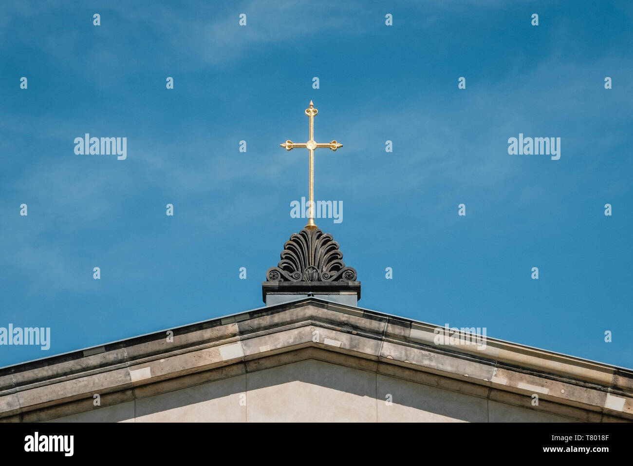 golden cross on church roof -  religion symbol - christianity Stock Photo