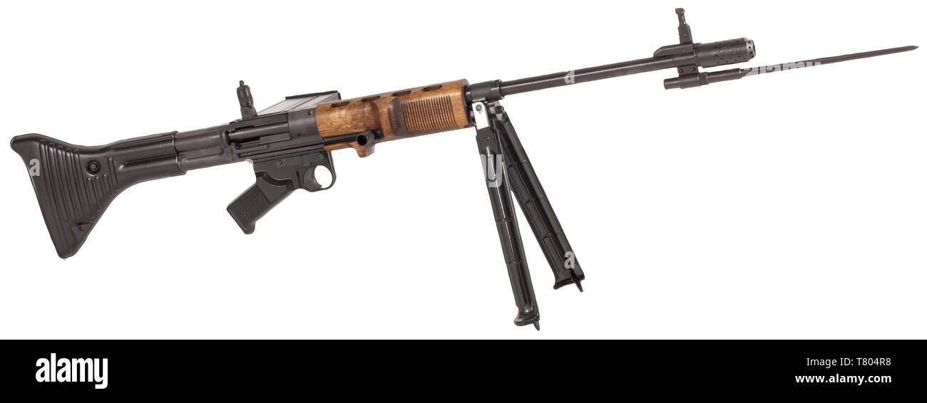 A Fallschirmjägergewehr 42 (FG 42), first model, lifelike model weapon by Shoei. Chamber marked 'FG 42 / fzs / 1494', various Luftwaffe acceptance marks on the left. All-metal production, aluminium bipod and shoulder stock. All parts fully movable and demountable. Blued completely black respectively anodised. Wooden hand guard. Comes complete with magazine and spike bayonet. Mint condition. Length 93 cm. No certificate required. historic, historical, ordnance weapon, service weapon, weapons, arms, weapon, arm, militaria, German, Germany, 20th century, Editorial-Use-Only Stock Photo