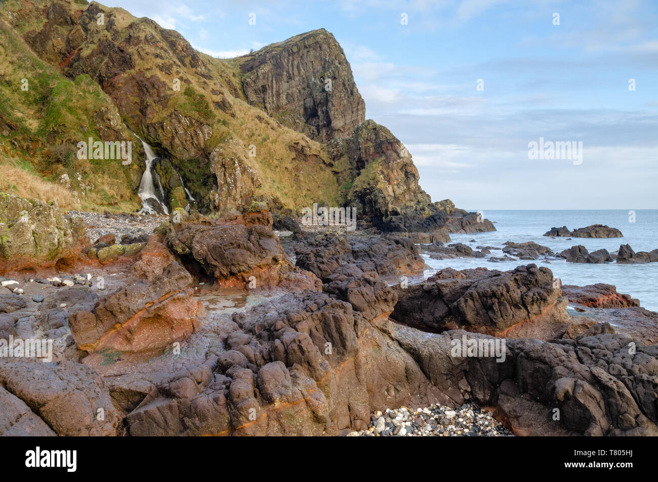 The Gobbins is a cliff-face path etched out along the dramatic shoreline of Islandmagee, County Antrim, Northern Ireland along the Causeway Coast. Stock Photo