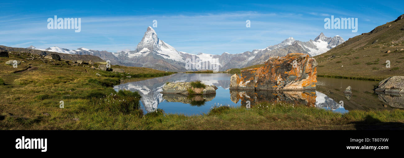 The Matterhorn reflected in Stellisee lake in the Swiss Alps, Switzerland, Europe Stock Photo