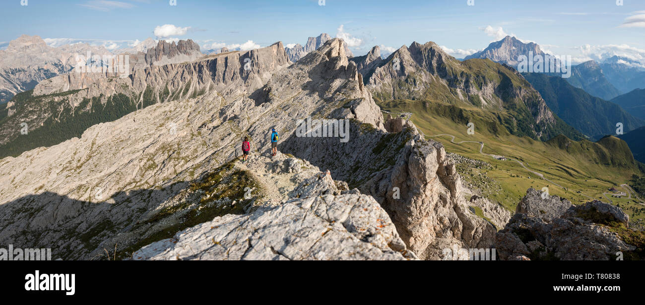 Hiking in typical mountainous terrain of the Dolomites range of the Alps on the Alta Via 1 trekking route near Rifugio Nuvolau, Belluno, Veneto, Italy Stock Photo