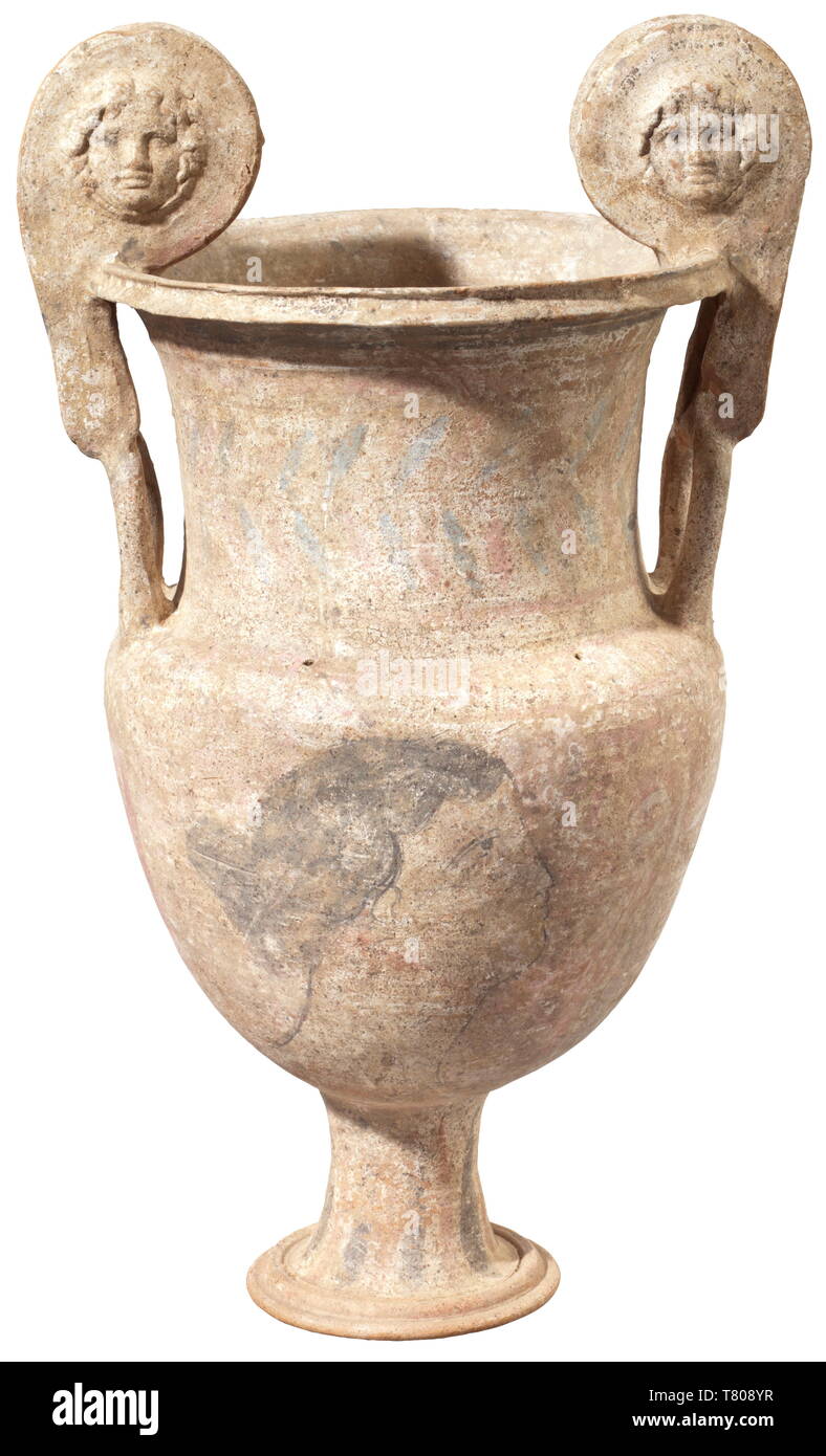 A Canosan volute krater, Apulia, 2nd century BC. Reddish clay. Bulbous body on a narrow foot with two volute handles decorated with gorgoneia. Polychromatic (rubbed) paintings, the body with two horses and Nike as well as a female portrait, the shoulder with lattice pattern. Glued clay fragments. Height 54.5 cm. French antiquities certification available. historic, historical, ancient world, ancient times, Greek, Hellas, ancient world, Additional-Rights-Clearance-Info-Not-Available Stock Photo