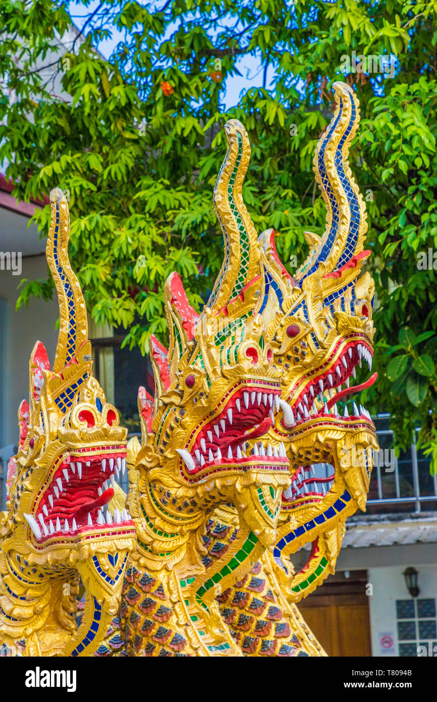 Serpentine dragons on a temple at the Office of National Buddhism, in Phuket Town, Phuket, Thailand, Southeast Asia, Asia Stock Photo