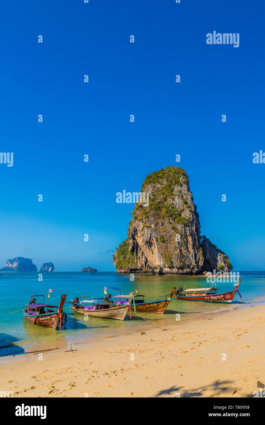 Long tail boats on Phra Nang Cave Beach on Railay in Ao Nang, Krabi Province, Thailand, Southeast Asia, Asia Stock Photo