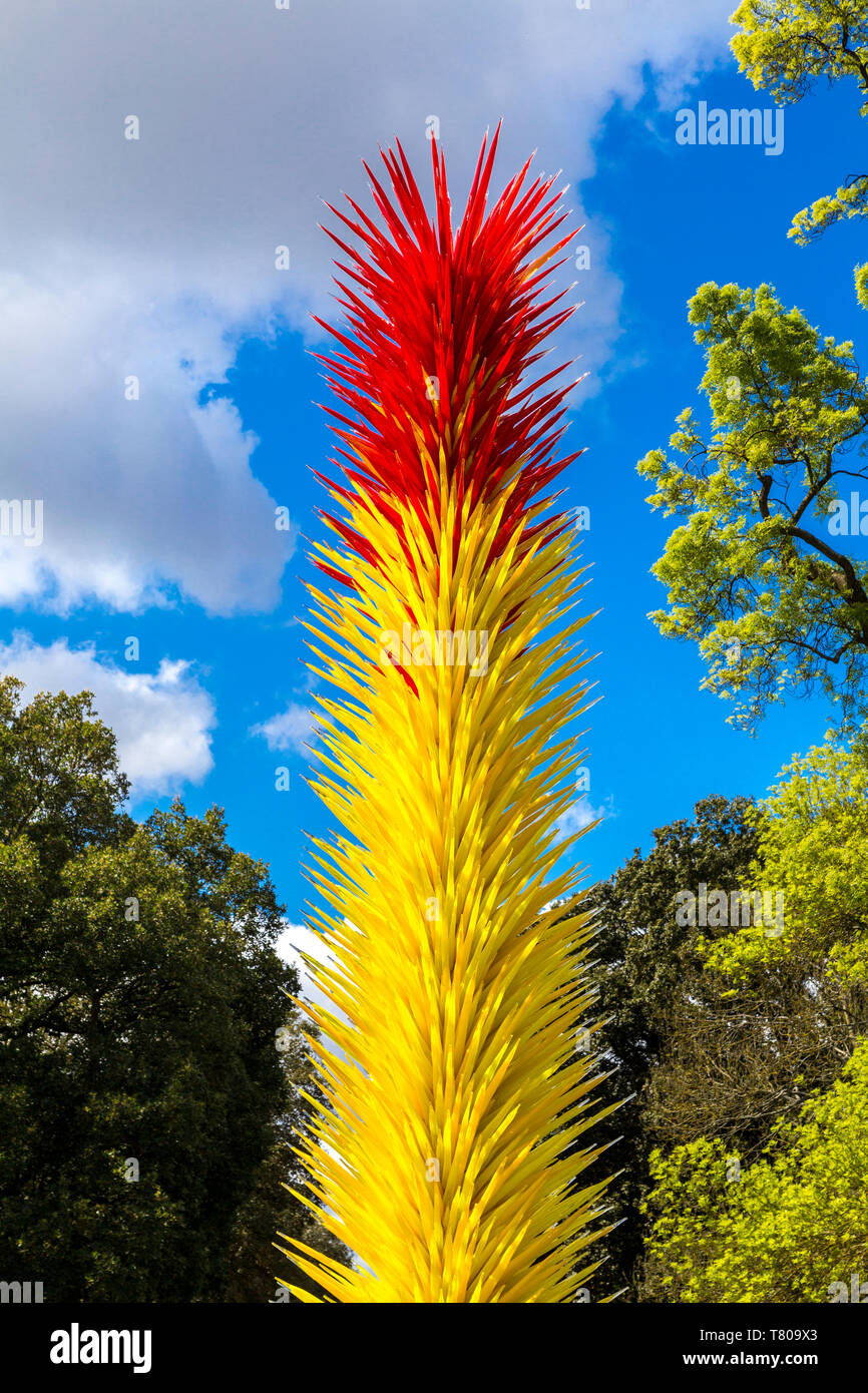 4th May 2019 - Dale Chihuly glass sculpture 'Scarlet and Yellow Icicle Tower' (2013) as part of temporary exhibition at Kew Gardens, London Stock Photo