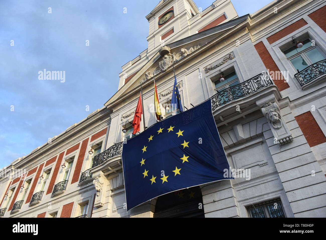 Madrid, Spain. 9th May, 2019. The European Union flag is seen hanging on the Royal Post Office building, seat of the Presidency of the Community of Madrid, during the celebration of Europe Day. Credit: John Milner/SOPA Images/ZUMA Wire/Alamy Live News Stock Photo
