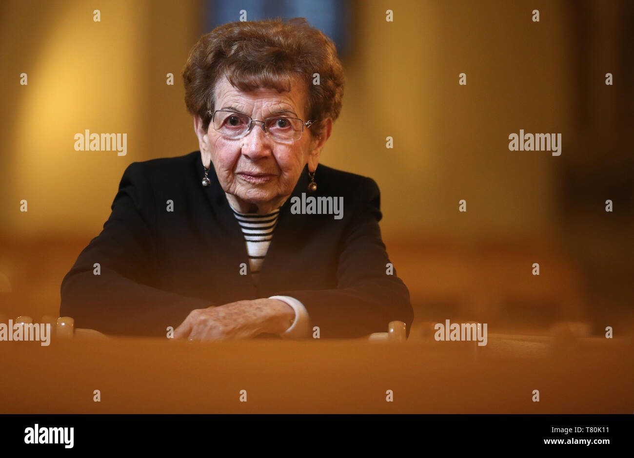 09 May 2019, Saxony-Anhalt, Magdeburg: Holocaust survivor Batsheva Dagan (93 years old) sits in Magdeburg Cathedral after a reading. Dagan read from her book 'Blessed be the imagination - cursed be it', with texts from her time in the three concentration camps Auschwitz, Ravensbrück and Malchow. Photo: Ronny Hartmann/dpa-Zentralbild/ZB Stock Photo