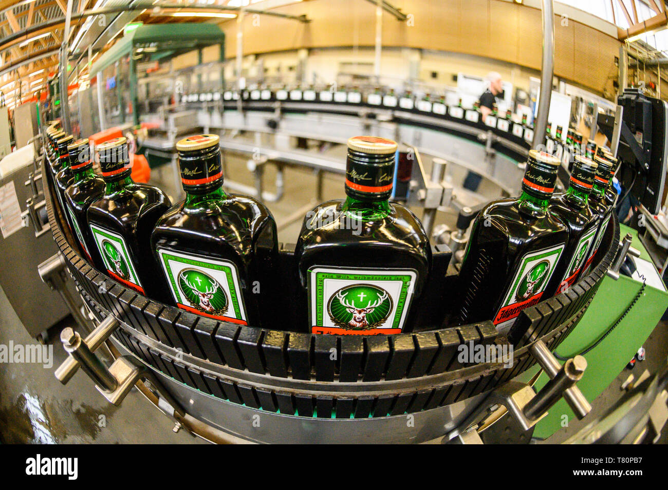Wolfenbüttel, Germany. 10th May 2019. Jägermeister bottles are transported  on a conveyor belt in the newly expanded filling plant of the beverage  manufacturer Jägermeister. With this expansion, Jägermeister has, according  to its