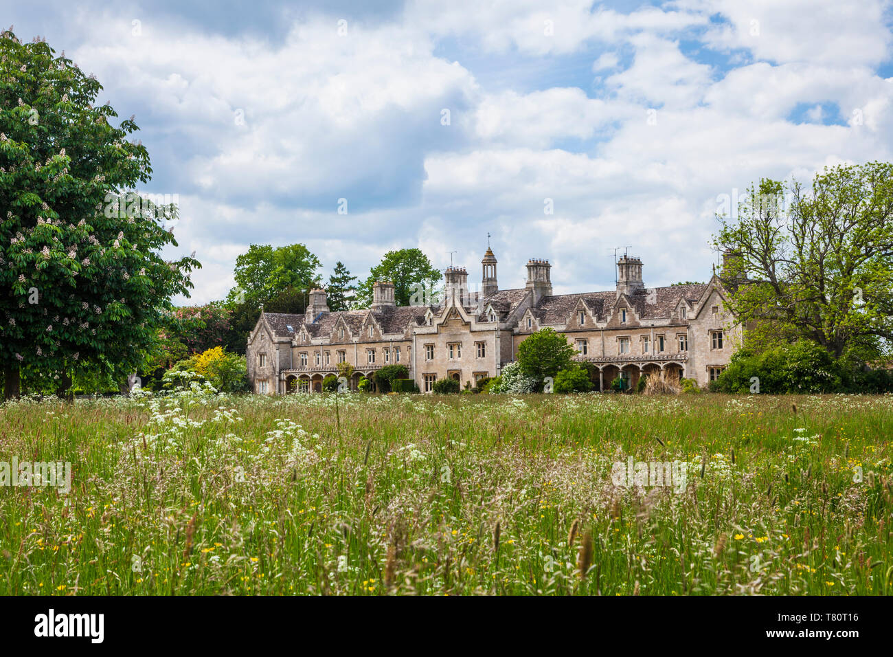 Edwards College, a row of twelve Tudor Gothic almshouses in South Cerney, Gloucestershire. Stock Photo